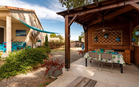 Villa Marie-Jo: Plant, Sky, Building, Table, Cloud, Shade, Wood, Outdoor Furniture, Tree, Flowerpot