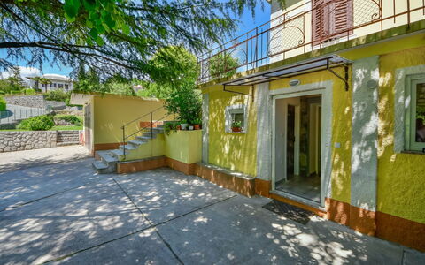 Sandra: Property, Real Estate, House, Building, Yellow, Home, Residential Area, Architecture, Neighbourhood, Tree