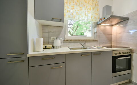 Sandra: Room, Cabinetry, Furniture, Kitchen, Property, Countertop, Interior Design, Tile, House, Floor