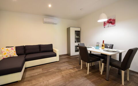 Sandra: Room, Property, Furniture, Interior Design, Floor, Living Room, Building, Wood Flooring, Table, Real Estate