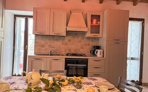 Valloria 602: Furniture, Interior Design, Wood, Flooring, Kitchen, Countertop, Kitchen Appliance, Kitchen & Dining Room Table, Room, Floor