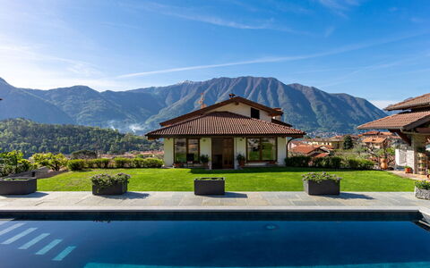 Villa del Sole: Plant, Sky, Water, Cloud, Mountain, Azure, Swimming Pool, Shade, Outdoor Furniture, Natural Landscape
