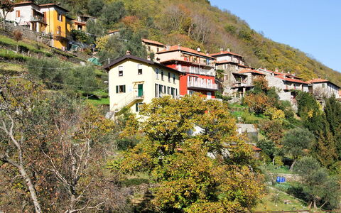 Casa Bel Sit: Building, Mountain, Sky, Plant, Natural Landscape, Highland, Window, House, Tree, Vegetation