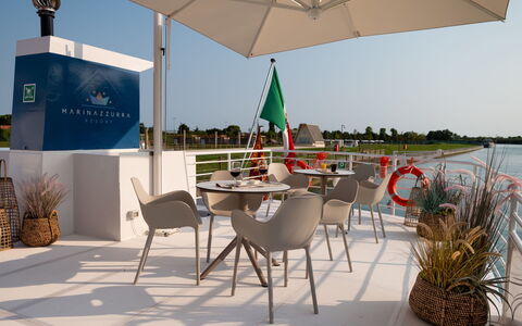 Lignano Riviera 610: Sky, Table, Plant, Property, Furniture, Umbrella, Building, Chair, Azure, Shade
