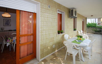 Lignano Sabbiadoro 644: Plant, Furniture, Property, Window, Building, Chair, Houseplant, Table, Flowerpot, Wood