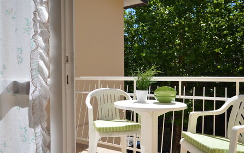 Villa Gaby: Furniture, Property, Wood, Chair, Shade, Table, Door, Outdoor Table, Building, Outdoor Furniture