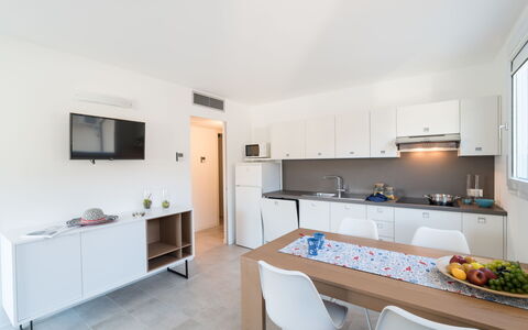 Lignano Sabbiadoro 653: Cabinetry, Furniture, Countertop, Table, Sink, Kitchen, Building, Chair, Interior Design, Houseplant