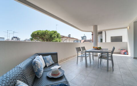 Lignano Sabbiadoro 653: Plant, Table, Building, Chair, Wood, Sky, Shade, Tree, Houseplant, Floor