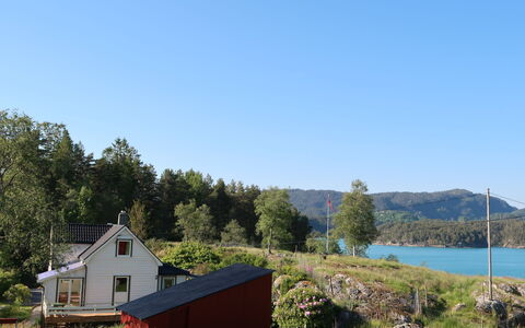Bjørkeneset: Plant, Water, Sky, Tree, Window, Building, Natural Landscape, House, Highland, Lake