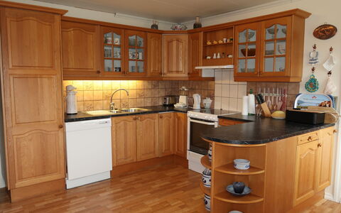 Gule Huset: Countertop, Cabinetry, Furniture, Building, Drawer, Kitchen, Wood, Lighting, Home Appliance, Interior Design