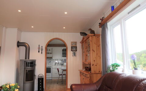 Gamlahuset: Plant, Furniture, Property, Couch, Building, Table, Houseplant, Wood, Picture Frame, Comfort