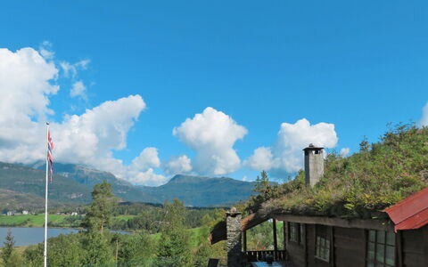 Anna: Cloud, Sky, Mountain, Plant, Building, Highland, Tree, Road Surface, Asphalt, Cumulus