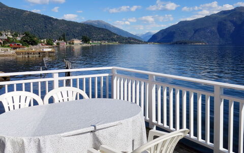 Naustet: Water, Sky, Cloud, Daytime, Property, Mountain, Furniture, Table, Light, Azure