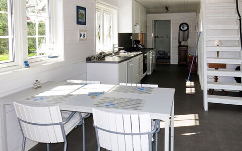 Naustet: Furniture, Table, Cabinetry, Window, Building, Chair, Kitchen, Couch, Wood, Floor