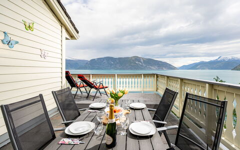 Hovsfjellet: Furniture, Flooring, Floor, Porch, Outdoor Furniture, Resort, Deck, Wood Flooring, Chair, Eco Hotel