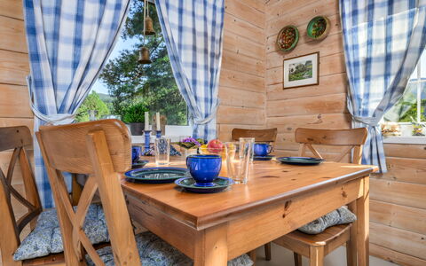 Synnøve: Table, Furniture, Plant, Azure, Window, Wood, Outdoor Furniture, Curtain, Interior Design, Building
