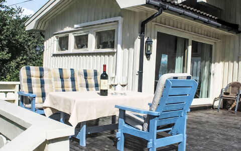 Åptafjorden: Wood, Furniture, Outdoor Furniture, Door, Home, Cottage, Chair, Porch, Shade, Siding