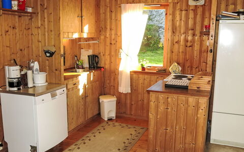 Åptafjorden: Wood, Flooring, Furniture, Floor, Interior Design, Cabinetry, Kitchen Appliance, Room, Wood Stain, Kitchen
