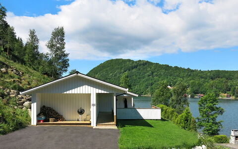 Espeøya: Cloud, Sky, Plant, Property, Building, Water, Tree, House, Natural Landscape, Grass