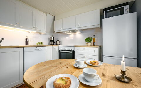 Johans Maria Stova: Food, Table, Cabinetry, Furniture, Tableware, Countertop, Dishware, Kitchen Stove, Interior Design, Wood