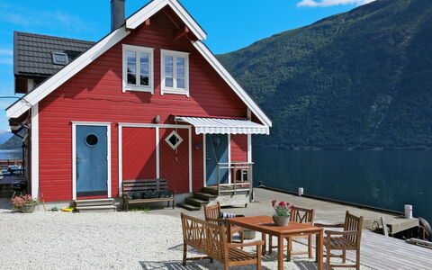 Arnafjord 609: Sky, Cloud, Property, Building, Window, Water, Table, Wood, Cottage, House
