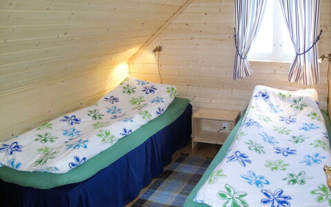 Arnafjord 609: Furniture, Property, Azure, Comfort, Pillow, Textile, Interior Design, Bed Frame, Wall, Floor