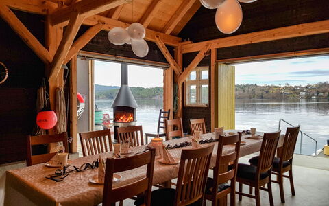 Strøneneset: Table, Furniture, Property, Chair, Wood, Lighting, Sky, Interior Design, Building, Window