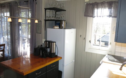 Evabu: Cabinetry, Furniture, Property, Window, Table, Countertop, Sink, Building, Wood, Interior Design