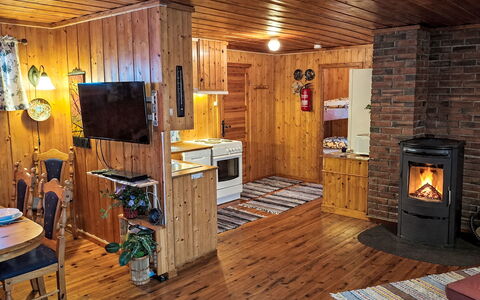 Midtholmen: Wood, Wood Stain, Ceiling, Room, Hardwood, Log Cabin, Cottage, Light Fixture, Plank, Wood Flooring