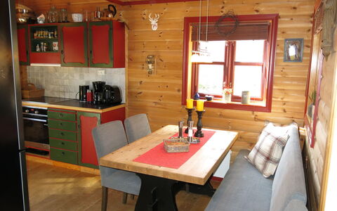 Troll: Table, Cabinetry, Furniture, Window, Wood, Interior Design, Floor, Hardwood, Wall, Building