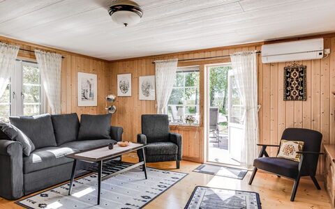 Mjöhult Utsikten: Furniture, Building, Picture Frame, Wood, Interior Design, Comfort, Living Room, Couch, Flooring, Floor