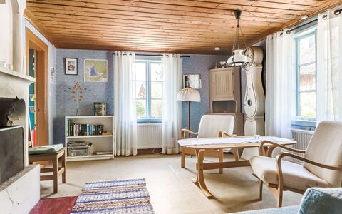 Ebbabolet: Furniture, Window, Table, Picture Frame, Blue, Cabinetry, Wood, Building, Chair, Interior Design