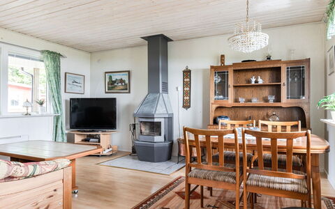 Gissarp Gryningen: Picture Frame, Furniture, Property, Couch, Cabinetry, Table, Television, Wood, Shelf, Drawer