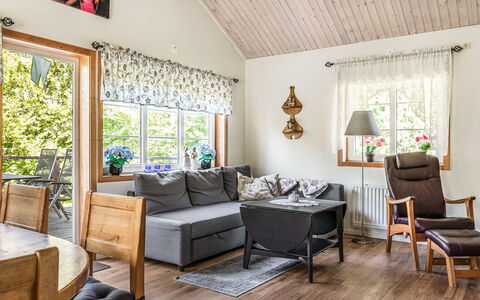 Gaslunda: Furniture, Property, Picture Frame, Table, Couch, Wood, Interior Design, Plant, Chair, Living Room