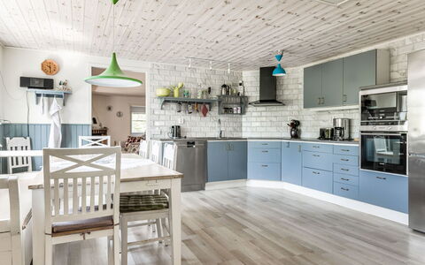 Erikstorp Villan: Countertop, Property, Cabinetry, Table, Kitchen, Lighting, Wood, Building, Interior Design, Living Room