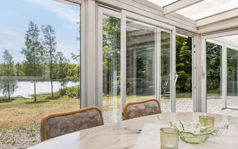Erikstorp 145: Plant, Tableware, Property, Furniture, Table, Building, Shade, Chair, Interior Design, Tree