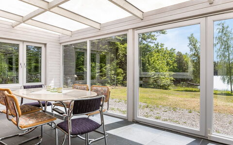 Erikstorp 145: Table, Plant, Furniture, Property, Chair, Shade, Building, Wood, Interior Design