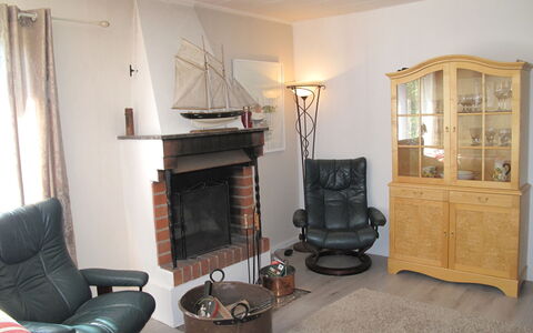 Trollsjö Stegeborg: Furniture, Cabinetry, Wood, Picture Frame, Interior Design, Living Room, Houseplant, Floor, Curtain, Hearth