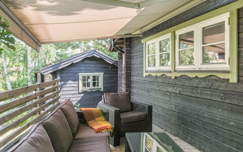 Rindö: Property, Window, Couch, Building, Wood, Interior Design, Plant, Cottage, Shade, Floor