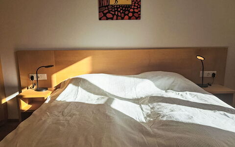 Bad Hofgastein 570: Bed, Bedroom, Furniture, Bed Sheet, Wood, Bedding, Interior Design, Flooring, Linens, Floor