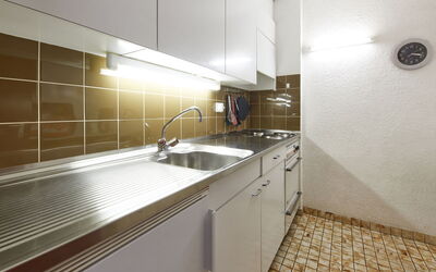 Arzinol 305 644.52: Tap, Cabinetry, Countertop, Plumbing Fixture, Sink, Kitchen Sink, Kitchen, Wood, Interior Design, Building