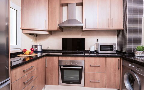 Erisa Ii: Cabinetry, Countertop, Kitchen, Property, Room, Furniture, Interior Design, Building, House, Major Appliance