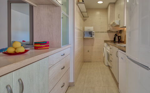 Residencial Roma: Room, Property, Floor, Furniture, Interior Design, Cabinetry, Yellow, Countertop, Building, Kitchen
