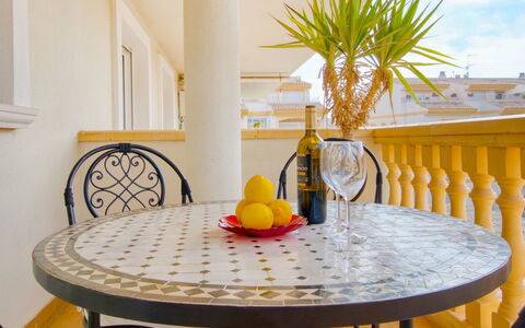 Residencial Roma: Yellow, Furniture, Room, Property, Table, Dining Room, Interior Design, Chair, Coffee Table, House