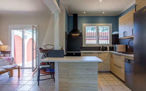 Ile de France: Furniture, Cabinetry, Countertop, Wood, Interior Design, Kitchen Appliance, Kitchen, Home Appliance, Table, Living Room