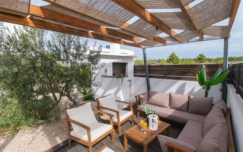 Villa Nika: Property, Furniture, Couch, Plant, Table, Shade, Wood, Interior Design, Outdoor Furniture, Porch