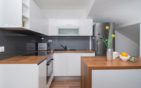 Villa Franko: Cabinetry, Countertop, Sink, Kitchen Sink, Building, Kitchen Stove, Kitchen, Interior Design, Flooring, Wood