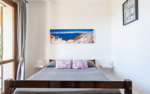 Casa della Mimosa: Furniture, Bedroom, Room, Bed, Property, Interior Design, Blue, Bed Frame, Wall, Floor