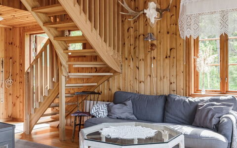 Kasen Sjökanten: Furniture, Property, Table, Couch, Building, Wood, Interior Design, Flooring, Floor, Beam