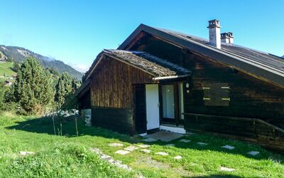 Champery 602: Sky, Building, Property, Plant, Window, Ecoregion, Mountain, Natural Landscape, Wood, Slope